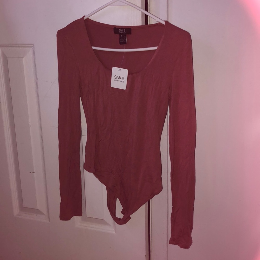 NWT pink bodysuit long sleeves small